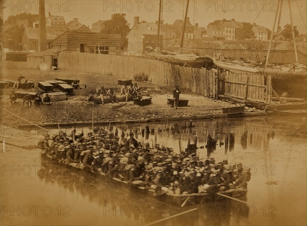 Raft of blanket boats ferrying field soldiers across the Potomac River 1863