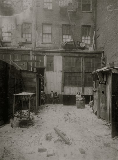 Rear view of tenement, 134 1/2 Thompson Street, New York City. See Photos of flower makers working here 1912