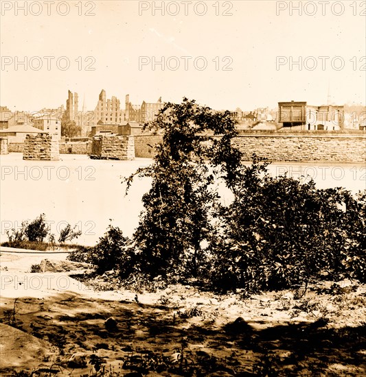 Richmond, Va. Ruins of Mayo's Bridge; the city beyond 1865