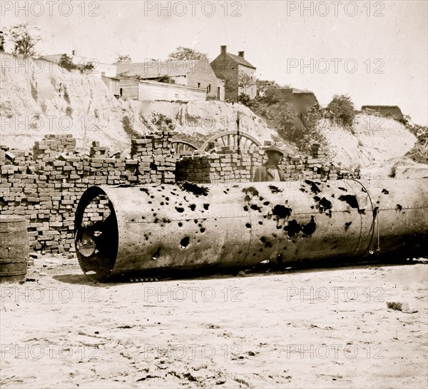 Richmond, Virginia. Smoke stack of C.S. Ram VIRGINIA No. 2. Holes made by Federal batteries 1865