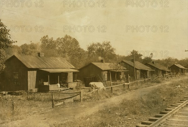 Row of Coal miners shanties on Elk River at Bream, W. Va. Location: Bream, West Virginia  1913
