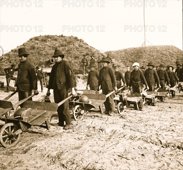 Savannah, Ga., vicinity. Sherman's troops removing ammunition from Fort McAllister in wheelbarrows 1864