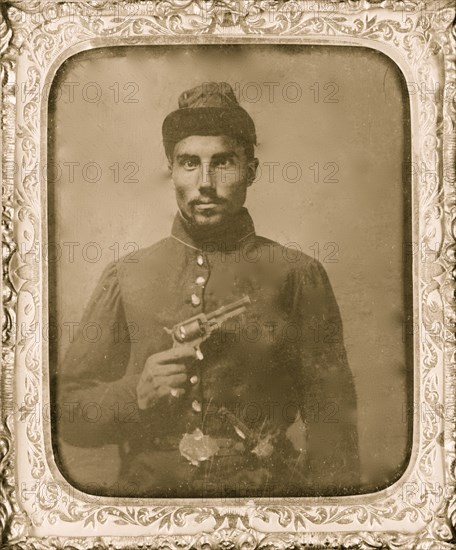 Seated black soldier with pistol and jacket 1865