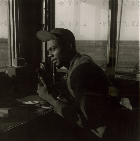 Sgt. William P. Bostic, 301st F.S. in control tower, March 1945 1945