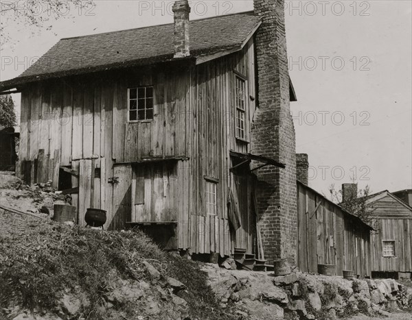 Some of the workers in the Rome (Ga.) Hosiery Mill live in shacks like these.  1913