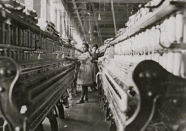 Spinner in Bibb Mil No. 1, Macon, Ga. Bad lighting and ventilation in spinning room.  1909