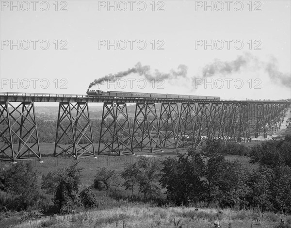 Steam Train passes over Valley Trestle Bridge 1900