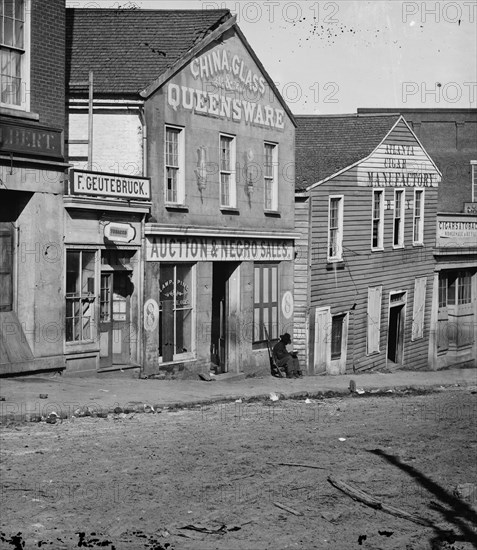 Storefront offers China, Glass, Queensware and is also a Slave Auction House 1862