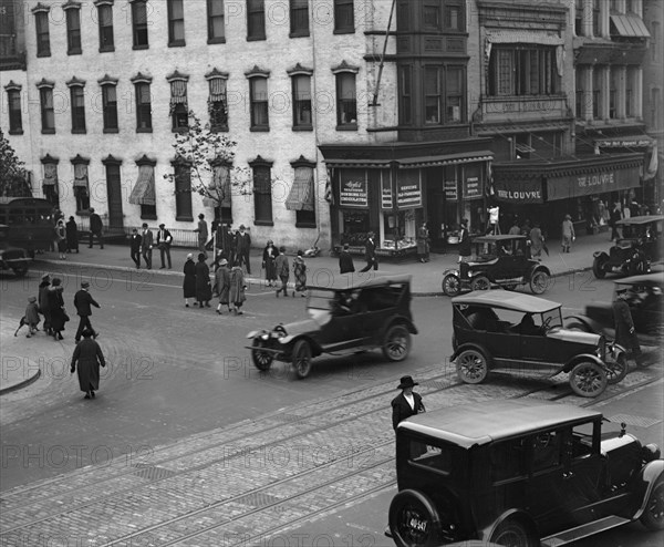 Street Corner in Washington DC with and growing traffic 1924