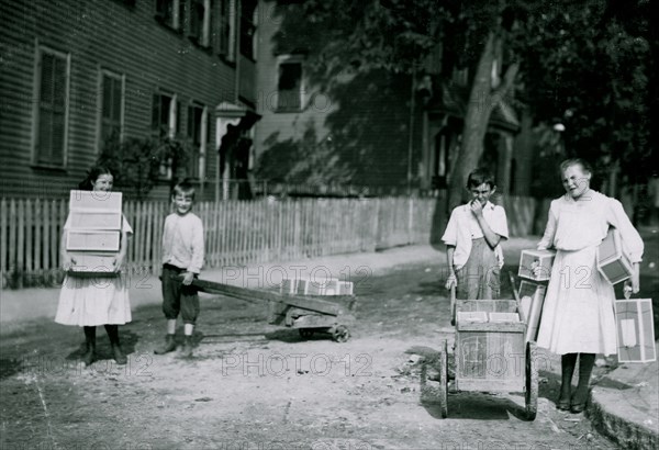 They carry home the tags in all kinds of carts, baby carriages and in their arms. Often heavy loads and long distances 1912