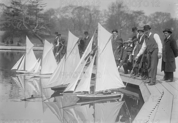 Toy Yachts are the pride of Central Park Enthusiasts as they race them in a Park Pond