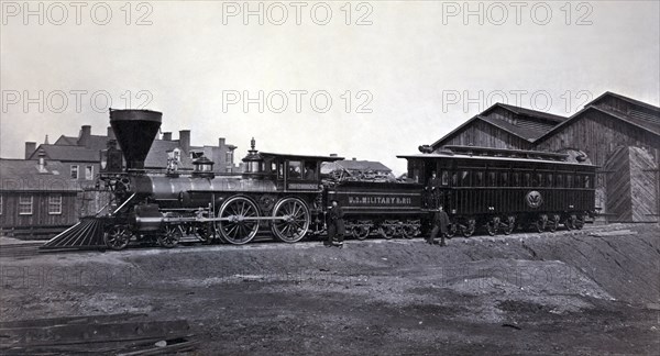 Engine W. H. Whiton, and President's car, Alexandria, January,1865 1865