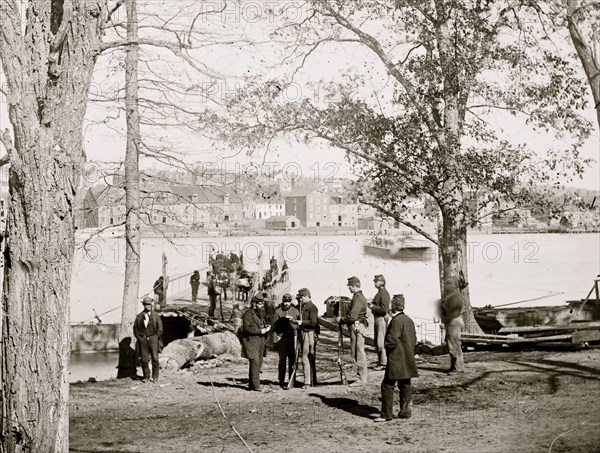 Washington, D.C. Guards at ferry landing on Mason's Island examining a pass 1863