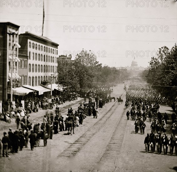 Washington, District of Columbia. Grand Review of the Army. Infantry passing on Pennsylvania Avenue near the Treasury 1865