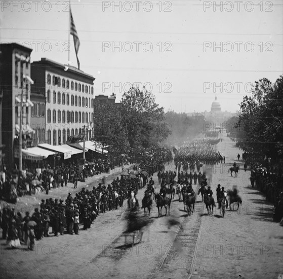 Washington, District of Columbia. The Grand Review of the Army. Gen. Jefferson C. Davis, staff and 19th Army Corps passing on Pennsylvania Avenue near the Treasury 1865