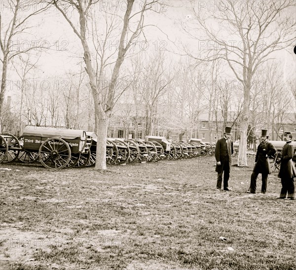 Washington, District of Columbia. Wiard gun at U.S. Arsenal. (L to R: Gen. Daniel Sickles, N.P. Willis, H.L. Stuart 1862