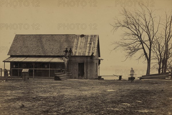 Workers constructing a wood building 1863