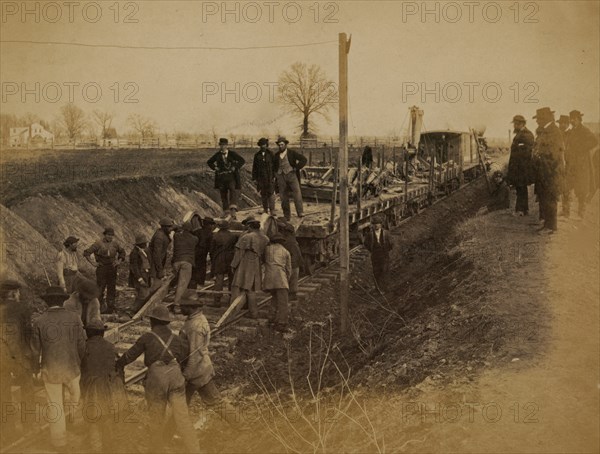 Wrecking train and gang clearing wreck 1863