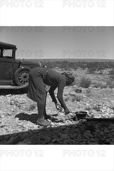 Cooking on the Ground in the Heat 1938