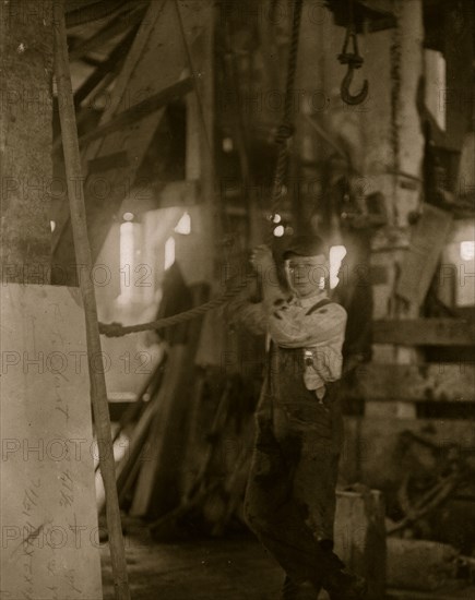 Young boy running machine in Vermont Marble Co., Centre Rutland, VT 1910