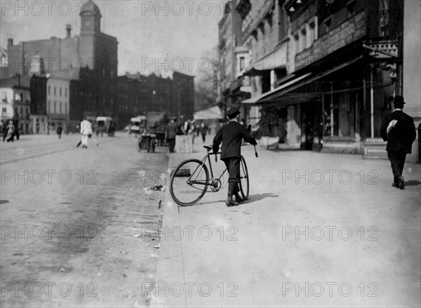 Young messenger making an office call 1912