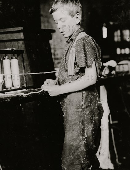 Youngsters making bands, cotton mill.  1910