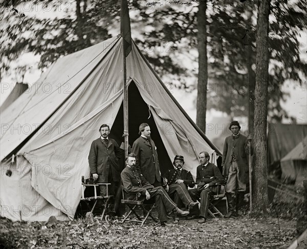 Zouave ambulance crew demonstrating removal of wounded soldiers from the field 1863