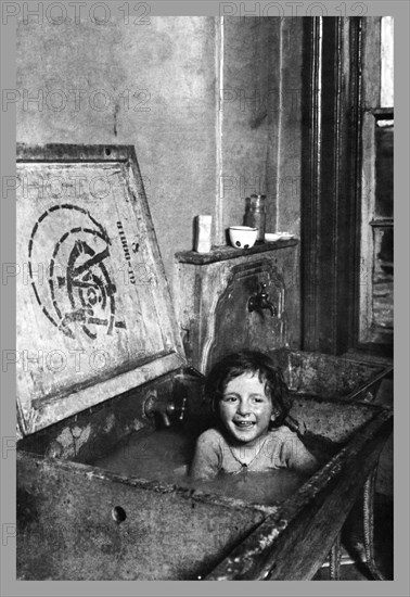 Child Bathes in Sink