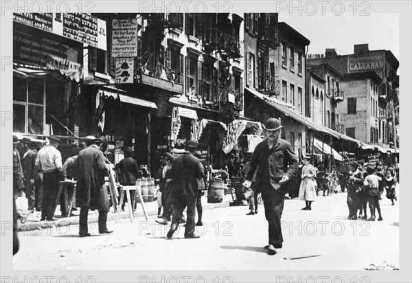 Street Level View of People Walking on Hester Street 1890