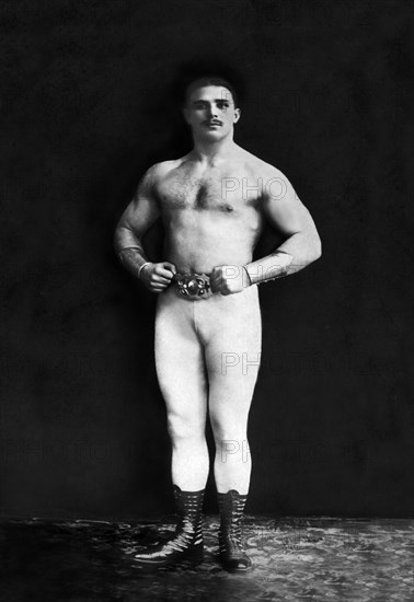 Bodybuilder in Leotard and Boots