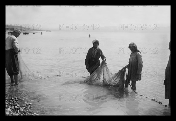 Fisherman Toiling with the Nets on the Sea of Galilee