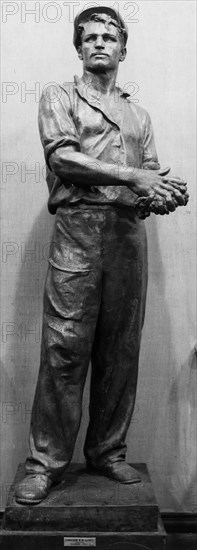 A worker' bronze sculpture by v, sokolov at the all-union art exhibition, 1950.