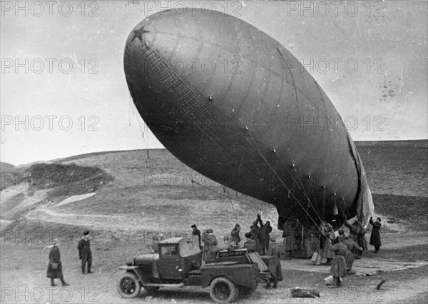 World war 2, soviet soldiers preparing to deploy a barrage balloon in poland, 1945.