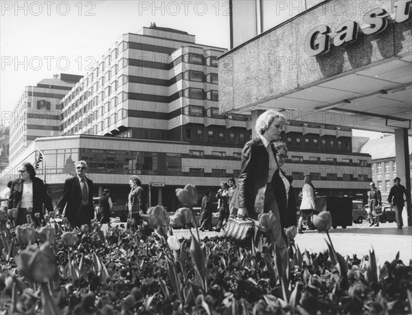 Berlin, east germany, gdr, 1979, the new palace hotel with restaurant and shopping complex nears completion.