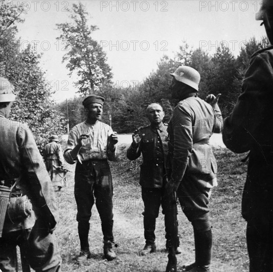 Nazi invasion of poland, german soldiers with polish p,o,w,s in september 1939.