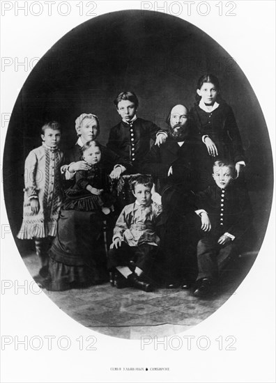The ulyanov family in simbirsk in 1879, the seated are lenin's parents, maria alexandrovna and ilya nikolayevich, who was a public school inspector, the children are (standing from left to right): olga, alexander and anna, the seated; maria on her mother's lap, dmitri and vladimir (lenin).