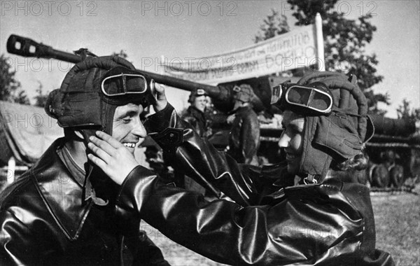 The boiko's tank unit receives new js-122 (joseph stalin 122) heavy tanks, 1942, tank commander,  junior lieutenant alexandra boiko and her husband, driver/mechanic ivan boiko.