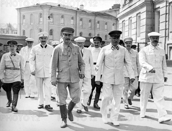 Red square, moscow, ussr july 24 1936, all-union physical culture parade, left to right, leaving kremlin to go to red square: nikolay yezhov (head of nkvd), dimitrov (third  row), l,m, kaganovich, josef stalin, kalinin, mikoyan, k, voroshilov, andreev, molotov.