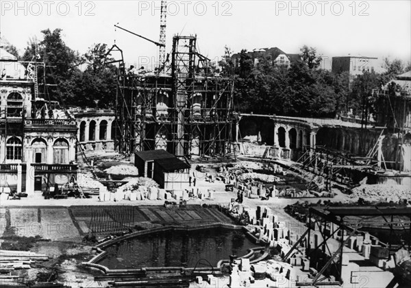 The zwinger palace in dresden, germany in 1953, after the start of renovations, the palace is being rebuilt after being destroyed by bombing at the end of world war 2 in 1945.