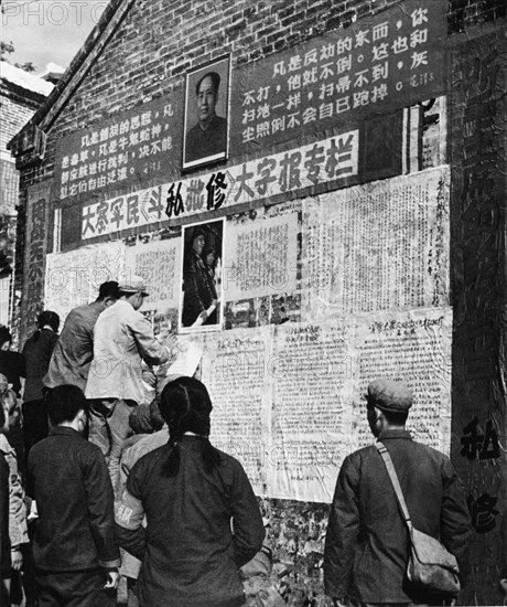 Big character wall posters put up by peasants of tachai and soldiers of the people's liberation army which 'follow chairman mao's great strategic plan and unfold mass revolutionary criticism and repudiation,' china, 1970.