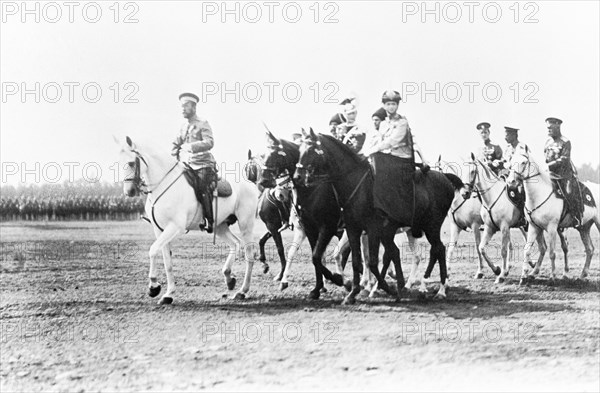 The third hussar yelisavetgrad her highness grand duchess olga nikolayevna's regiment and the eight uhlan voznesensky her highness grand duchess tatyana nikolayevna's regiment reviewed in the presence of his majesty nicholas ll in new peterhof, 1913.