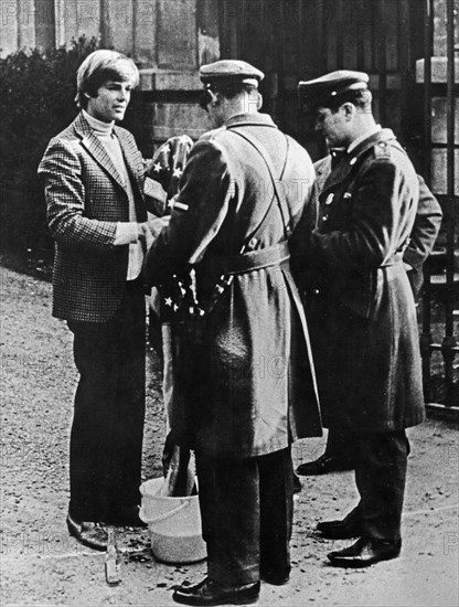 American singer, actor and director dean reed being arrested in santiago, chile after his second concert which he ended with the song 'venceremos' ('we win') which is banned there, 1970.