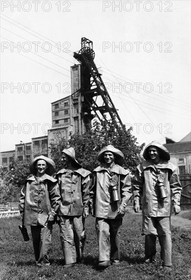 Mining family, alexander ivanovich torba (3rd from left) and his three sons (l to r), vladimir, nikolai, and viktor, at the start of their shift at the 'nikitovka' mine no, 4-5 in gorlovka, stalino region, ukrainian ssr, 1954.