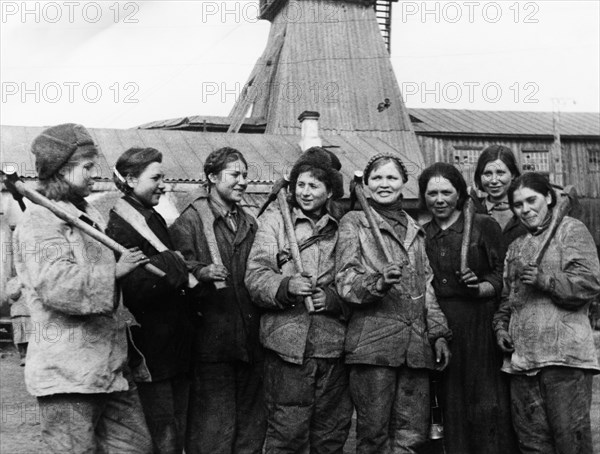 A group of young women who work in the krasnaya gornyachka mines near chelyabinsk, they have taken the place of their husbands and brothers who are soldiers that are fighting at the front, world war 2.