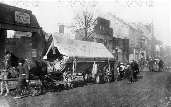 German civilian refugees returning to their home town near the end of world war 2, 1945.