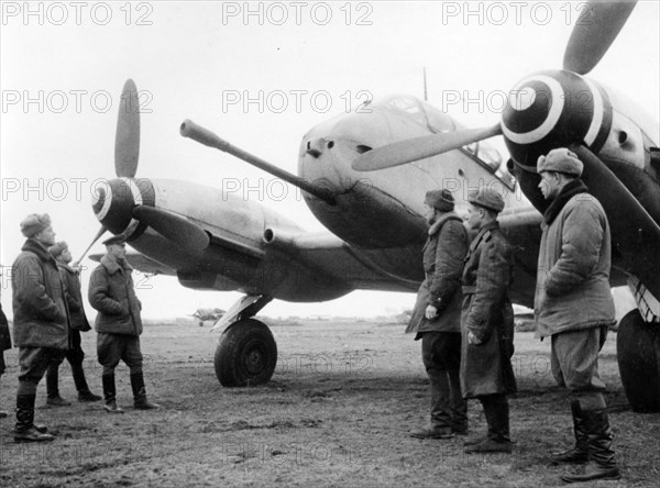 The latest type of 'messerschmitt' captured by soviet troops on an enemy airdrome, the gun is of the 50mm type, world war ll.