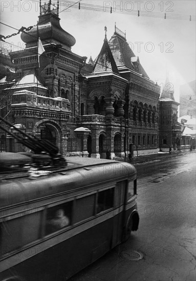 Moscow, late 1930s, a trolley-bus going past the french embassy building.