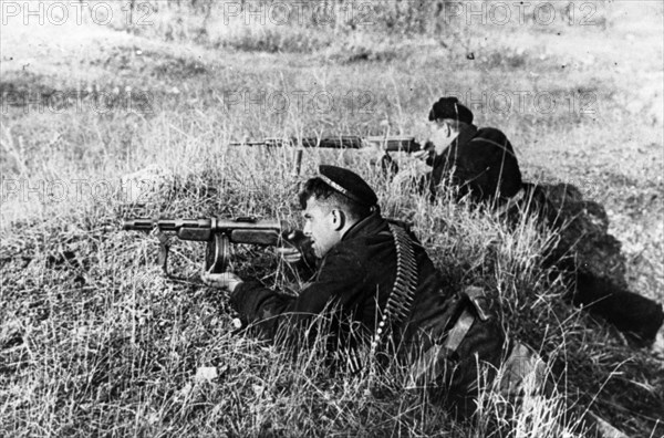 The defence of sevastopol, crimea, red navy automatic rifle men firing the enemy, in march 1942.