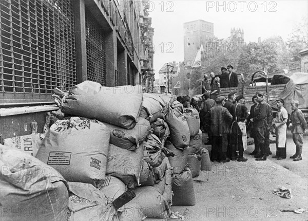 Soviet food relief, bags of flour and suger ready for distribution to stores in berlin, 1945 or 1946.