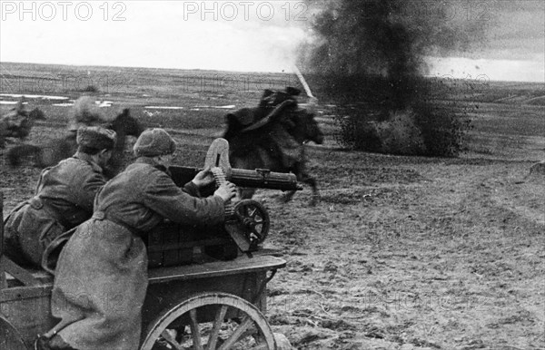 A machine-gun carriage supporting a red army cavalry charge, may 1944.